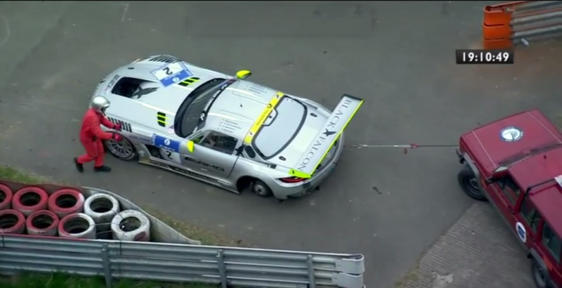 Illustration for article titled Black Falcon AMG N24 Driver Loses A Wheel, The Race, His Mind